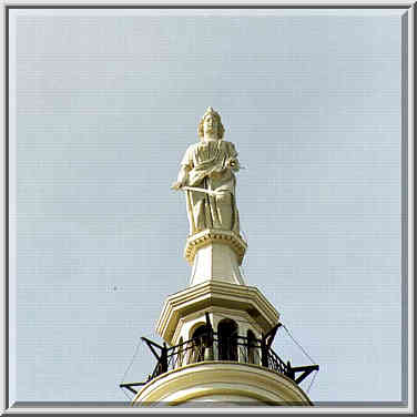 A statue at the top of Tippecanoe County Court House. Lafayette, Indiana, January 18, 1998.