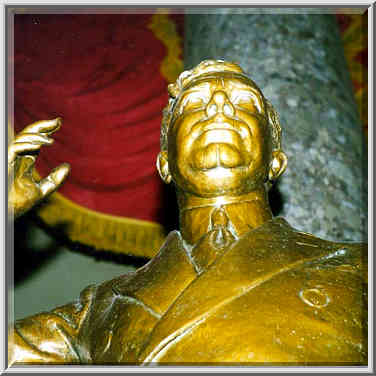 A memorial sculpture with a red banner ...[9 words]... Washington DC, February 4, 1998.