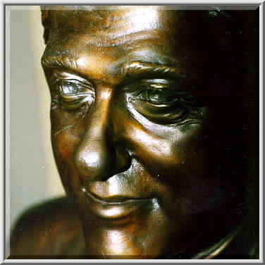 A bronze likeness of the current American ...[8 words]... Washington DC, February 4, 1998.