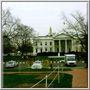 White House with an armed man on its roof seen ...[4 words]... Washington DC, February 5, 1998.