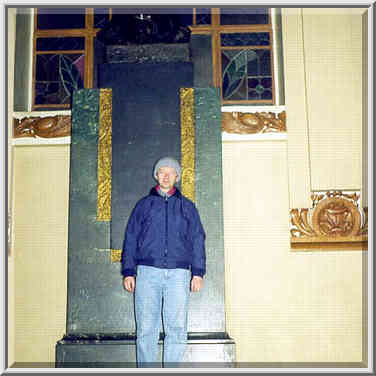 A.S. in front of a black Lenins monument on ...[3 words]... St. Petersburg, Russia, April 7, 1999.