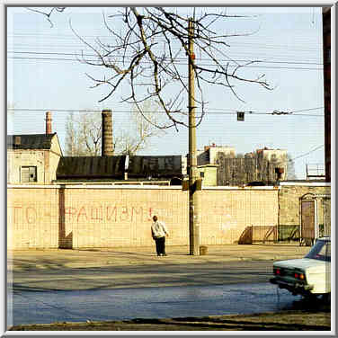 A bus stop at Svetlanovsky Prospect. An ...[15 words]... St. Petersburg, Russia, April 13, 1999.