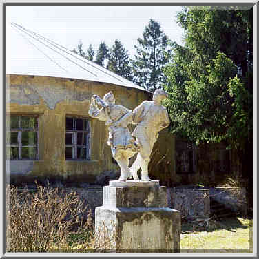 Soviet era sculpture of dancing peasants(?) in ...[13 words]... St. Petersburg, Russia, April 26, 1999.