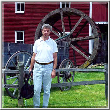 A.S. at Adams Mill (a big wheel is a decoration, ...[2 words]... worked there). Indiana, May 15, 1999.