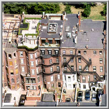 View of gardens on roofs of houses at ...[4 words]... Tower in Boston, August 3, 1999.