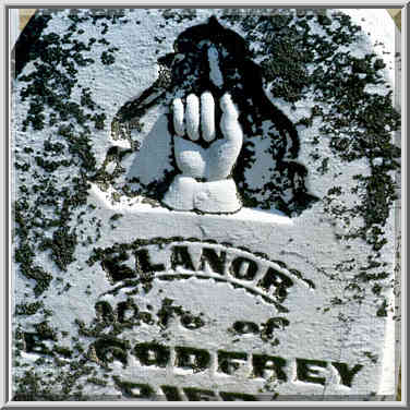 A mysterious sign on a marble grave of L. Godfrey ...[15 words]... Lafayette, Indiana, September 25, 1999.