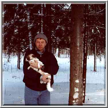 A.S. beside a fir-tree in Aleksandrovsky Park in ...[7 words]... Petersburg). Russia, January 27, 2000