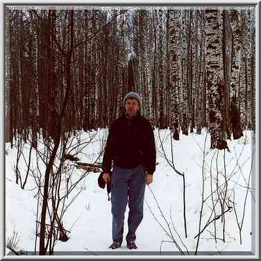 A.S. in front of birches in Sosnovka Park. St. Petersburg, Russia, February 7, 2000