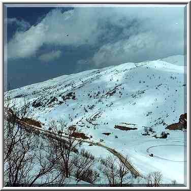 A lake and a road near Mt. Hermon. Golan Heights, the Middle East, February 19, 2000