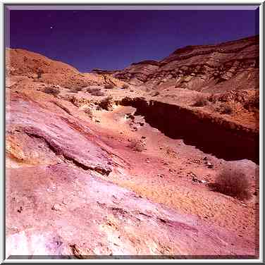 Multicolor sands in Big Crater (Makhtesh Gadol) ...[2 words]... Desert. The Middle East, March 11, 2000