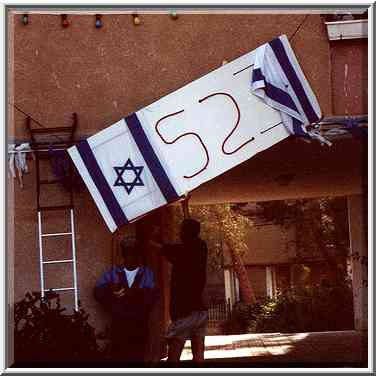 New immigrants decorate their house at Ben Gurion ...[5 words]... the Middle East, May 9, 2000