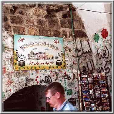 A sign of fulfilled Mekka pilgrimage (?) on a ...[6 words]... the Middle East, June 17, 2000