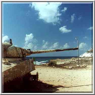 A junk tank on a beach near Rosh Hanikra. The Middle East, September 7, 2000