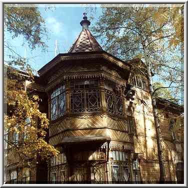 A wooden house built at the end of 19th century ...[9 words]... Petersburg. Russia, October 2, 2000