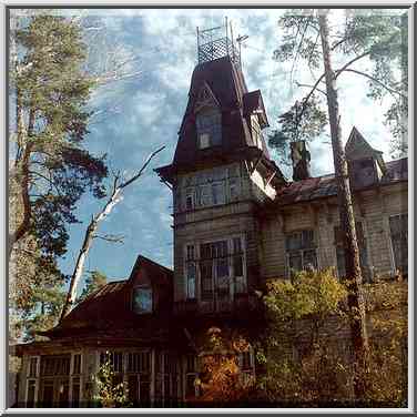 A wooden house built at the end of 19th century ...[9 words]... Petersburg. Russia, October 2, 2000