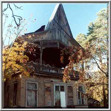 A wooden house built at the end of 19th century ...[9 words]... Petersburg. Russia, October 2, 2000