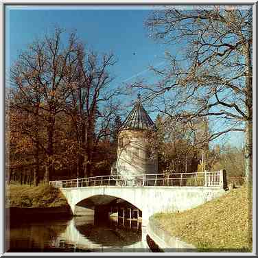 Pil Tower and a bridge over Slavianka River in ...[6 words]... Petersburg, Russia, October 11, 2000