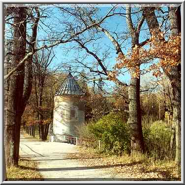 Pil Tower and a road across Slavianka River in ...[6 words]... Petersburg, Russia, October 11, 2000