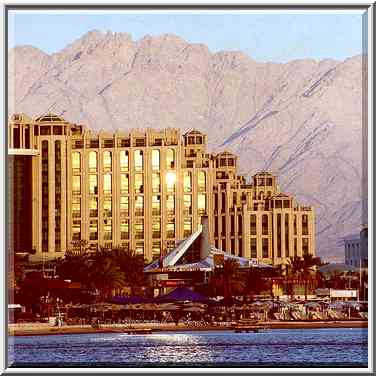 A hotel and a city beach during sunset, with ...[6 words]... the Middle East, January 13, 2001