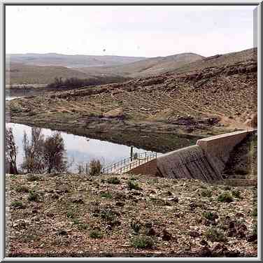 A damn of a polluted water reservoir. Yeroham, the Middle East, March 8, 2001