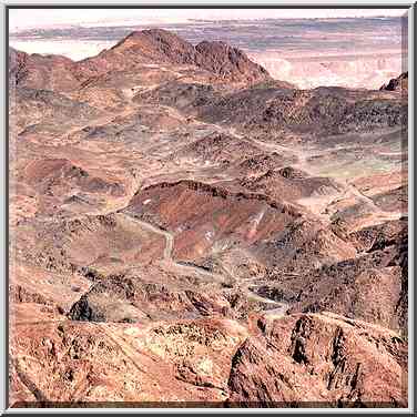 View of a road and old mines along Alakhson River ...[2 words]... Stage. The Middle East, March 15, 2001