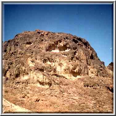 A hill in Makhtesh Ramon crater, view from a bus ...[4 words]... Eilat. The Middle East, March 22, 2001