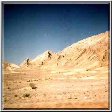 Hills in southern edge of Makhtesh Ramon crater, ...[8 words]... Eilat. The Middle East, March 22, 2001