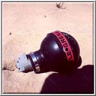 Dunes north from Ashkelon littered by unexploded ...[2 words]... The Middle East, April 5, 2001