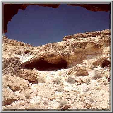 Caves with traces of a dried spring on the left, ...[9 words]... Boker. The Middle East, April 9, 2001