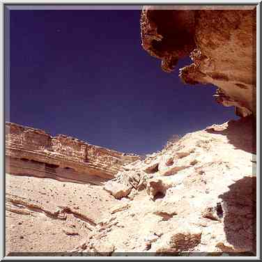 Caves along the trail on the eastern side of the ...[11 words]... Boker. The Middle East, April 9, 2001