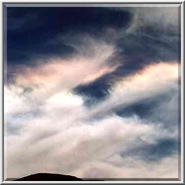 Rainbow-like glow over Timna cliffs in Timna ...[2 words]... Eilat. The Middle East, April 25, 2001