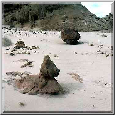 Ghostly forms in white sand at the foot of Timna ...[4 words]... Park. The Middle East, April 25, 2001