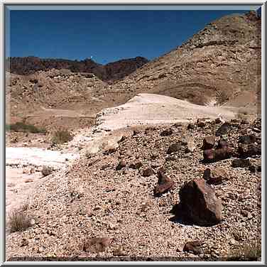 A wadi approaching Ramons Tooth (black hill) from ...[7 words]... Ramon. The Middle East, May 3, 2001