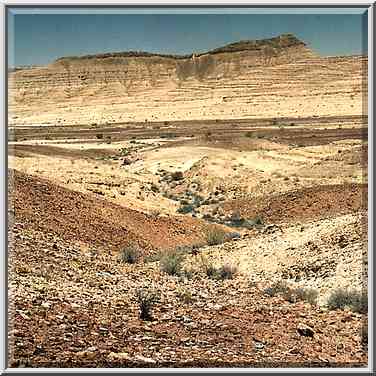 A hill at the bottom of Ramon Crater, view to the ...[6 words]... Ramon. The Middle East, May 3, 2001