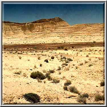 A hill at the bottom of Ramon Crater, view to the ...[6 words]... Ramon. The Middle East, May 3, 2001