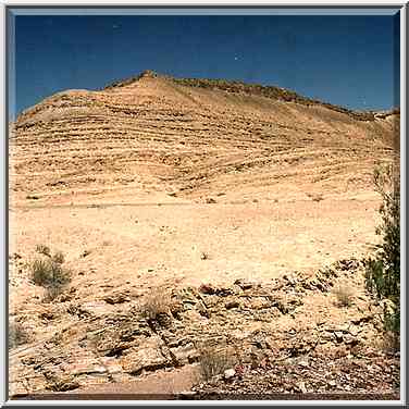 A hill at the bottom of Ramon Crater, view to the ...[6 words]... Ramon. The Middle East, May 3, 2001