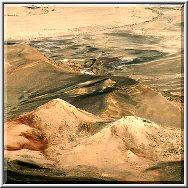 View of hills at the bottom of Ramon Crater from ...[11 words]... Center. The Middle East, May 3, 2001