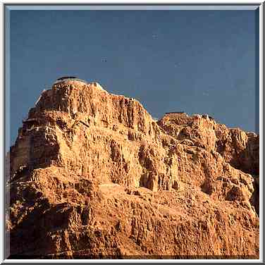 Masada fortress on the top of a hill, view from ...[8 words]... evening. The Middle East, May 10, 2001