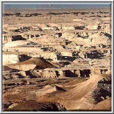 Streams and small canyons in the direction of ...[13 words]... Masada. The Middle East, May 10, 2001