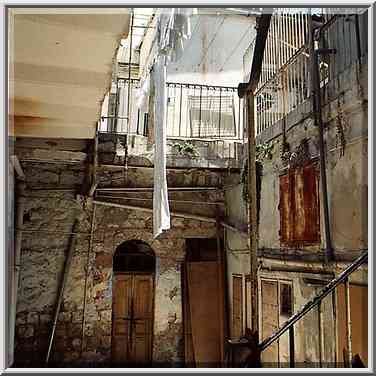 A yard at northern entrance to Mea Shearim ...[2 words]... the Middle East, June 17, 2001