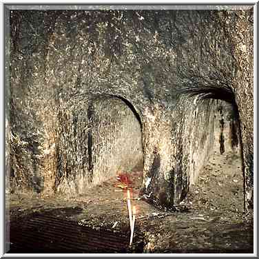 A chamber in the rock with tombs of J. of ...[13 words]... the Middle East, June 28, 2001