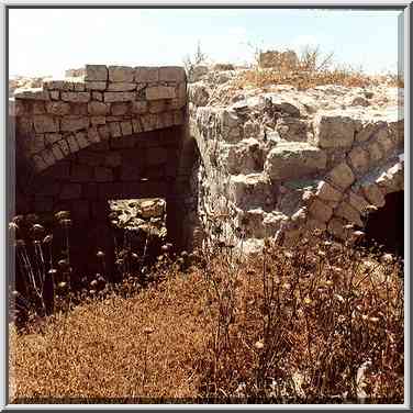 Destroyed houses of Bet Atab village, 4 miles ...[3 words]... Shemesh. The Middle East, July 5, 2001