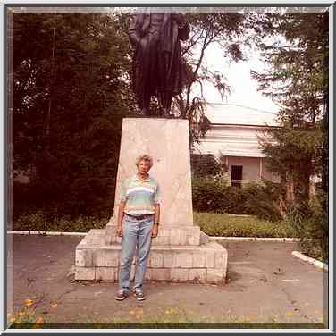 A.S. in front of a monument of V. I. Lenin in a ...[7 words]... south Ural. Russia, August 12, 2001