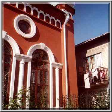 A synagogue at Pushkin St., with marijuana weeds ...[3 words]... Cheliabinsk, Russia, August 13, 2001