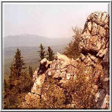 Rocks and forest of Aleksandrovskaya Sopka hill ...[2 words]... Southern Ural. Russia, August 14, 2001