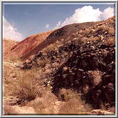 A creek with basalt rocks in Makhtesh Ramon ...[5 words]... The Middle East, October 18, 2001