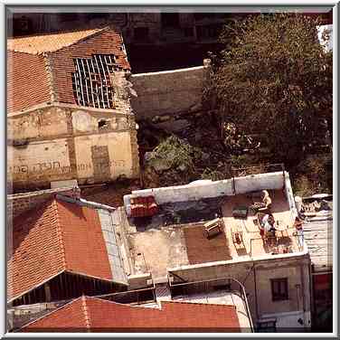 A lunch on a roof of a house at Shabazi Shalom ...[7 words]... Aviv, the Middle East, October 25, 2001